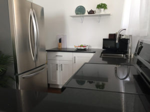 Kitchen, Quartz Countertops, Stainless Appliances - Upper Suite Serenity